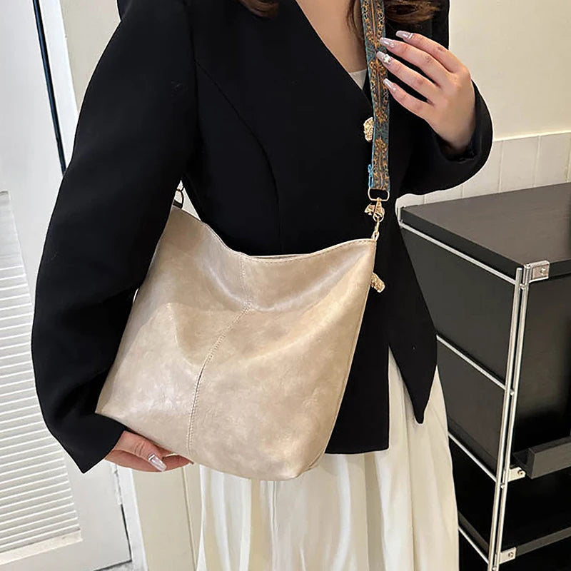 Women PU Leather Vintage Solid Color High-Capacity Simple Wide Strap Bucket Crossbody Bag