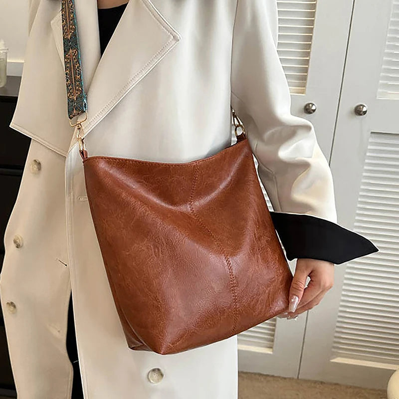 Women PU Leather Vintage Solid Color High-Capacity Simple Wide Strap Bucket Crossbody Bag